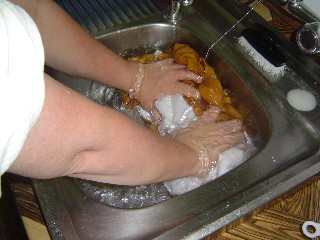 Julie washing by hand